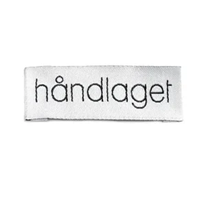 Symerke Hvit med sort, Håndlaget