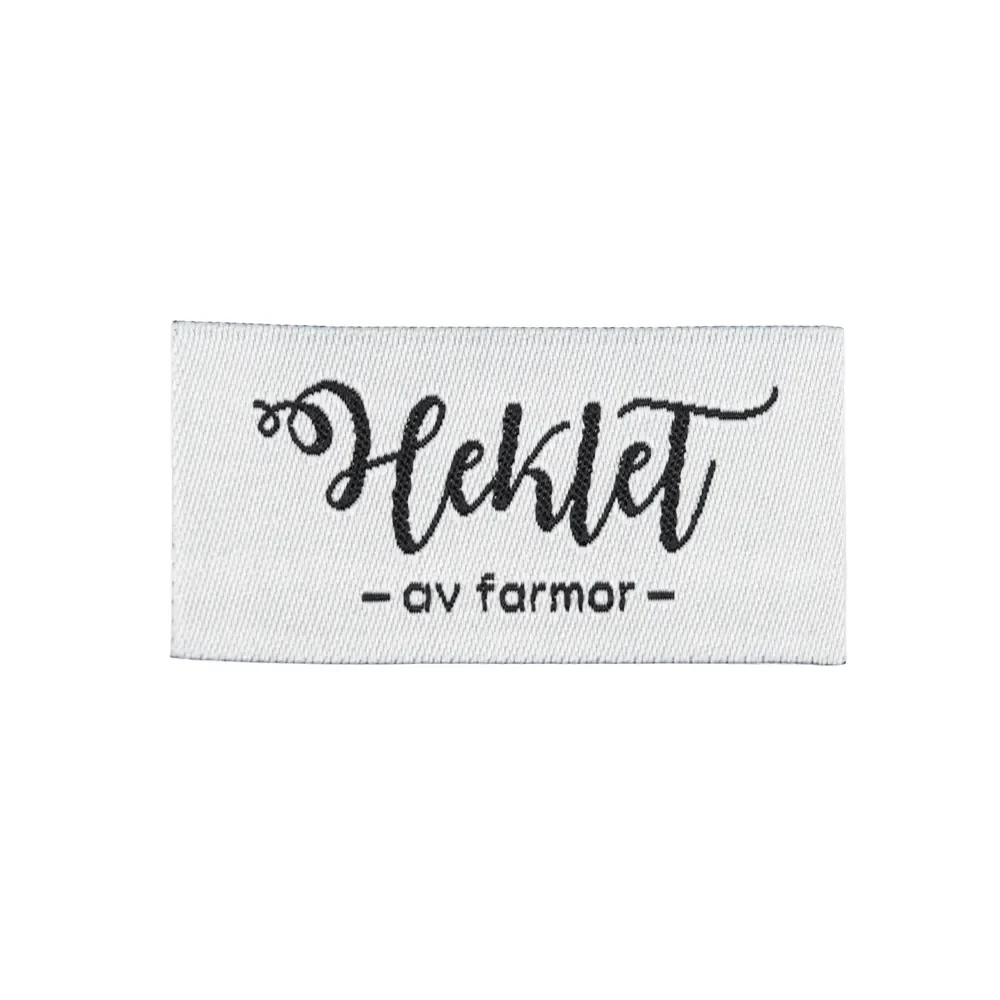 ba8fd67ea10136c89dc3a760bebca830.webp Symerke Heklet av farmor / Hvit med sort - Bilde 1