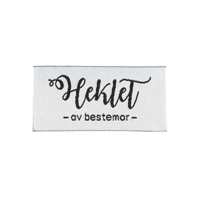 9e2c6bda947b4d0b3f3bd6fd3d27d0d7.webp Symerke Heklet av bestemor/ Hvit med sort - Bilde 1